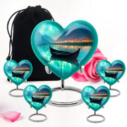 Vivid Teal Boat Cremation Urn close-up of engraving and surface detail - compassionate heart-boat combination with gentle curves - memorial set with one large and four small urns