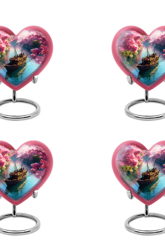 Coral Pink Boat Cremation Urn angled view of lid and engraved motif - loving heart memorial featuring boat pattern - 10 inch aluminum urn for cremated remains