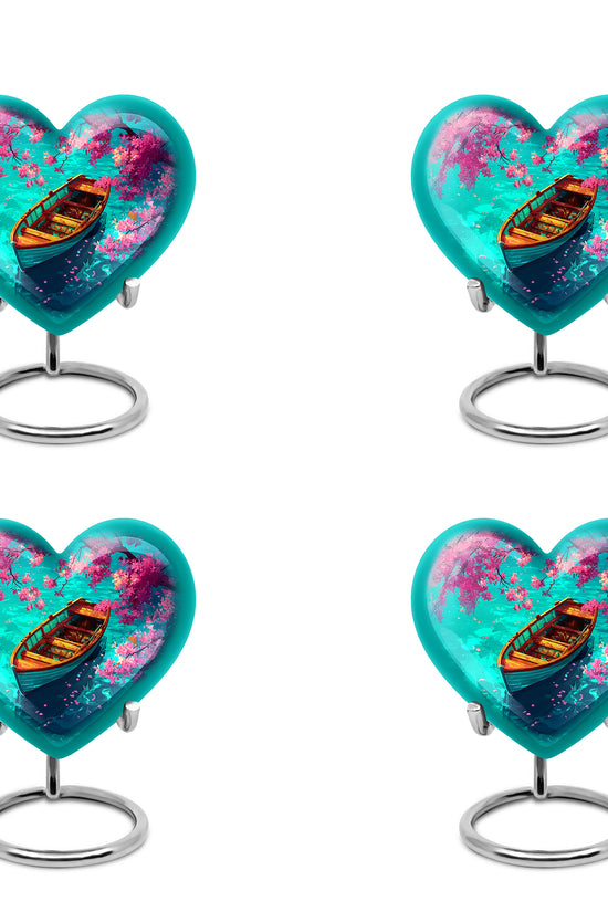 Jewel Teal Boat Cremation Urn angled view of lid and engraved motif - loving heart memorial featuring boat pattern - 10 inch aluminum urn for cremated remains