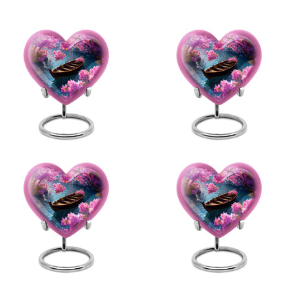 Dusty Blue Boat Cremation Urn angled view of lid and engraved motif - heart-shaped boat design symbolizing eternal love - 10 inch aluminum urn for cremated remains