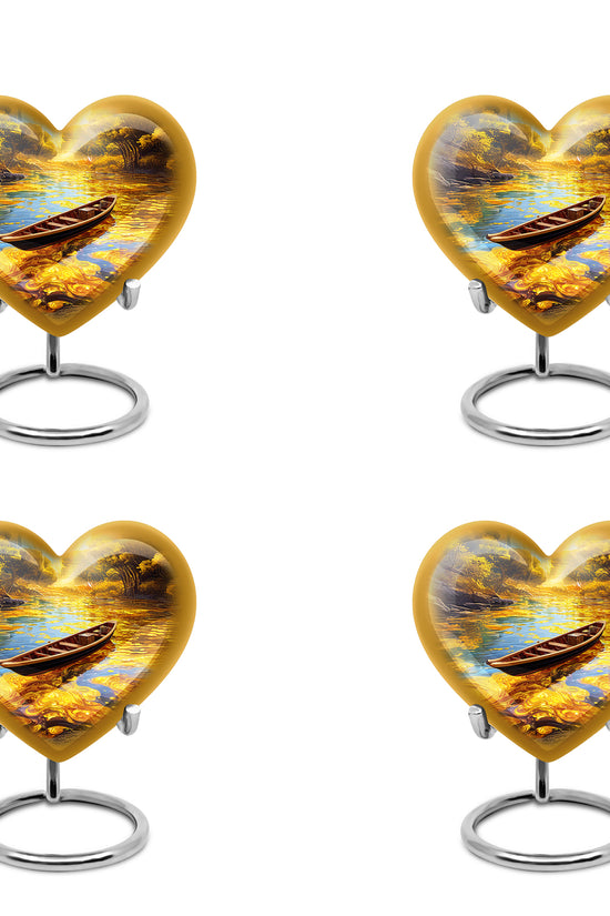 Warm Gold Boat Cremation Urn angled view of lid and engraved motif - romantic heart urn with boat motif on aluminum - 10 inch aluminum urn for cremated remains