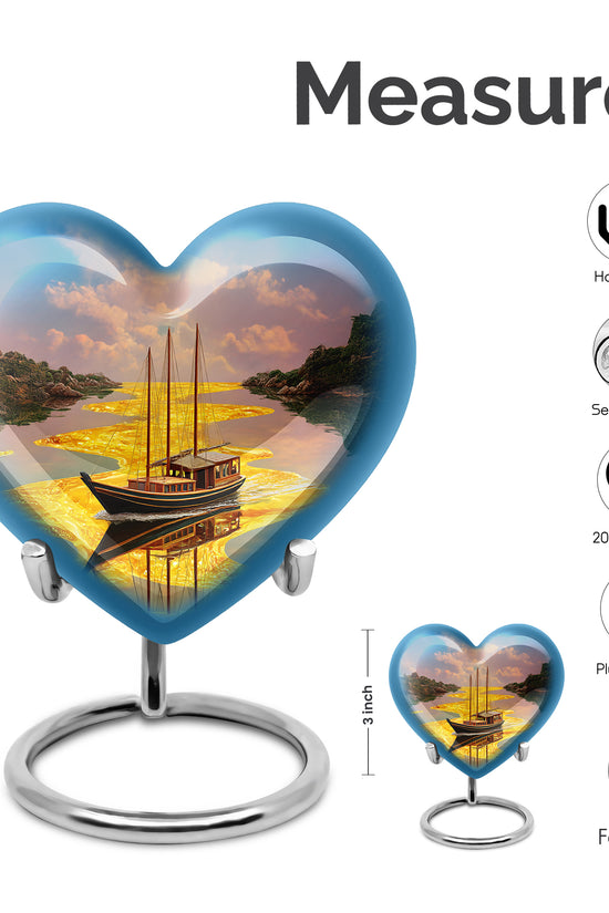 Royal Gold Boat Cremation Urn front view showing detailed design - romantic heart urn with boat motif on aluminum - mini keepsake memorial for portion of cremation ashes
