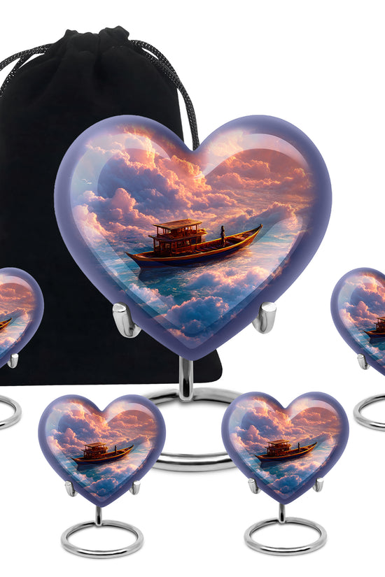 Cherry Red Boat Cremation Urn close-up of engraving and surface detail - compassionate heart-boat combination with gentle curves - memorial set with one large and four small urns