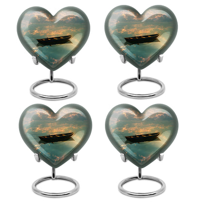 Dark Black Boat Cremation Urn angled view of lid and engraved motif - compassionate heart-boat combination with gentle curves - 10 inch aluminum urn for cremated remains