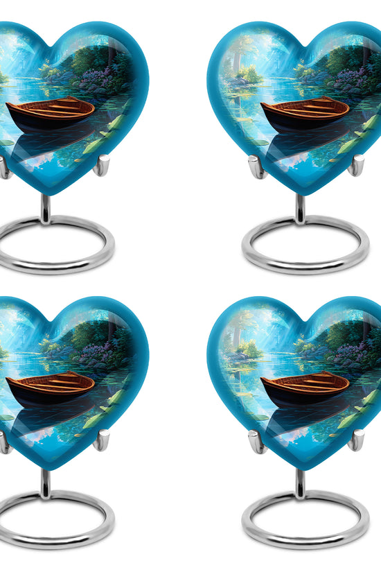 Misty Blue Boat Cremation Urn angled view of lid and engraved motif - heart-shaped boat design symbolizing eternal love - 10 inch aluminum urn for cremated remains