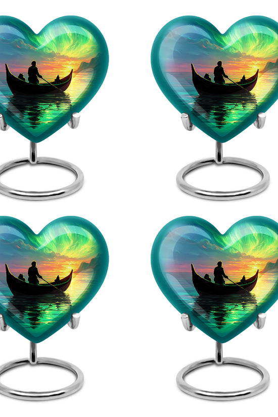 Misty Blue Boat Cremation Urn angled view of lid and engraved motif - heart-shaped boat design symbolizing eternal love - 10 inch aluminum urn for cremated remains