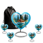Slate Blue Boat Cremation Urn close-up of engraving and surface detail - heart-shaped boat design symbolizing eternal love - memorial set with one large and four small urns