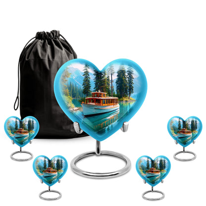 Slate Blue Boat Cremation Urn close-up of engraving and surface detail - heart-shaped boat design symbolizing eternal love - memorial set with one large and four small urns