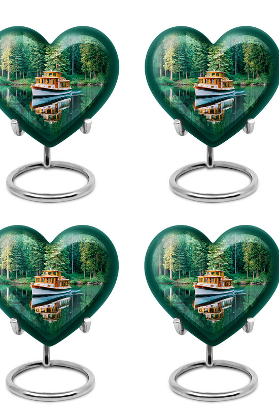 Jewel Teal Boat Cremation Urn angled view of lid and engraved motif - heart-shaped boat design symbolizing eternal love - 10 inch aluminum urn for cremated remains