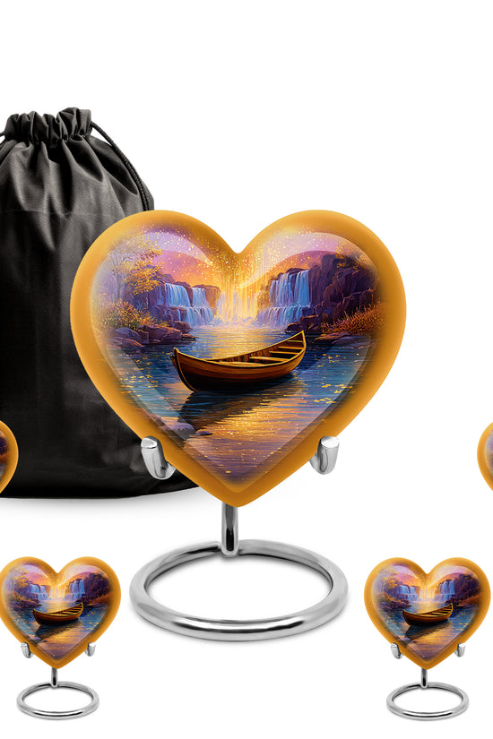 Dusty Pink Boat Cremation Urn close-up of engraving and surface detail - romantic heart urn with boat motif on aluminum - memorial set with one large and four small urns