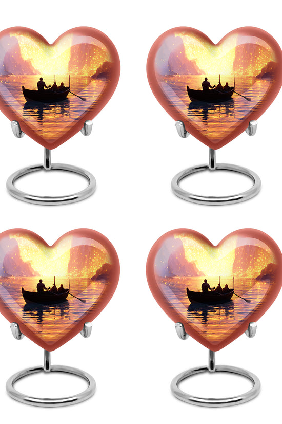 Garnet Red Boat Cremation Urn angled view of lid and engraved motif - loving heart memorial featuring boat pattern - 10 inch aluminum urn for cremated remains