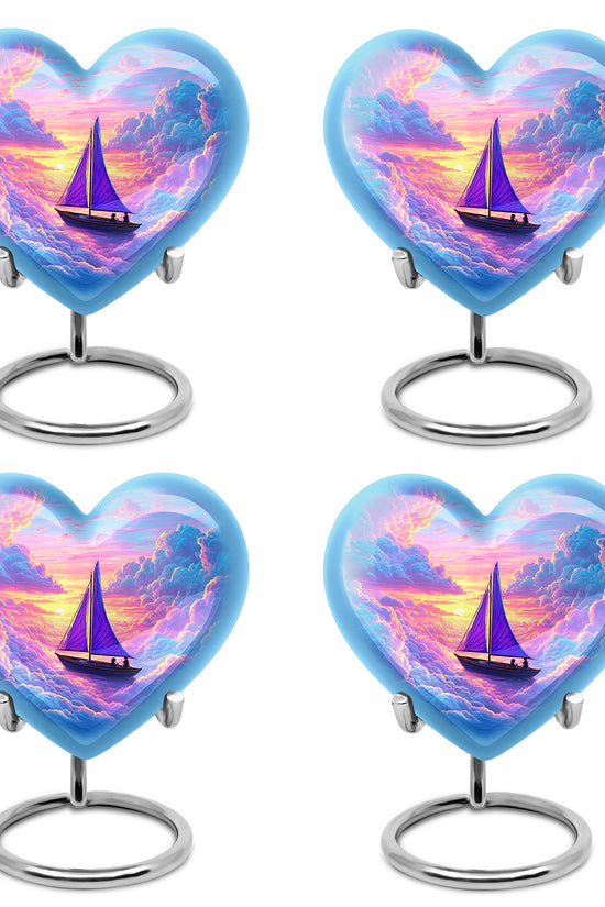Calming Blue Boat Cremation Urn angled view of lid and engraved motif - compassionate heart-boat combination with gentle curves - 10 inch aluminum urn for cremated remains