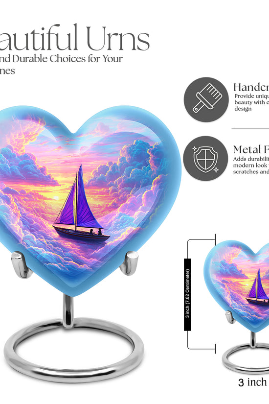 Misty Blue Boat Cremation Urn front view showing detailed design - heart-shaped boat design symbolizing eternal love - mini keepsake memorial for portion of cremation ashes