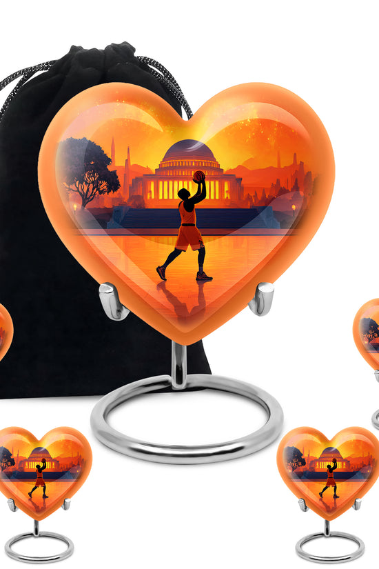 Burgundy Red Basketball Cremation Urn close-up of engraving and surface detail - heart-shaped basketball design symbolizing eternal love - memorial set with one large and four small urns