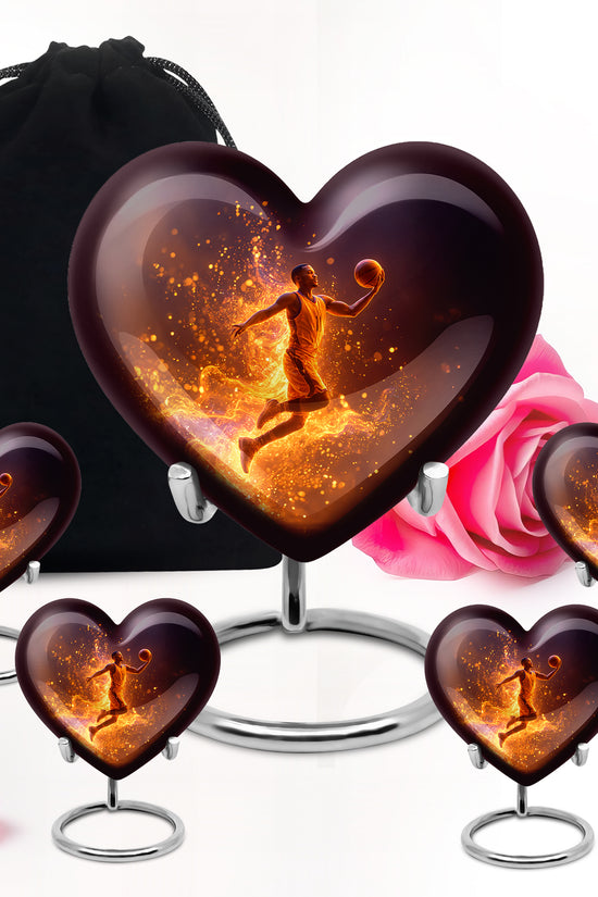Glossy Black Basketball Cremation Urn close-up of engraving and surface detail - heart-shaped basketball design symbolizing eternal love - memorial set with one large and four small urns