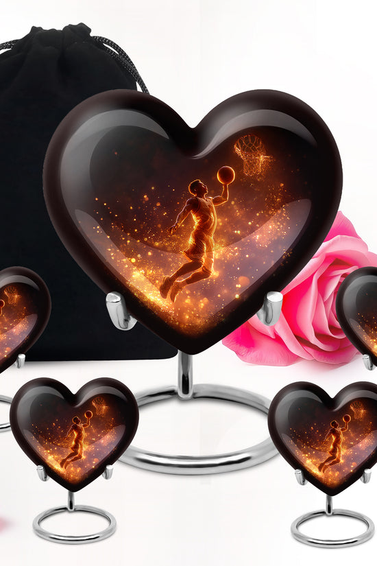 Charcoal Black Basketball Cremation Urn close-up of engraving and surface detail - romantic heart urn with basketball motif on aluminum - memorial set with one large and four small urns