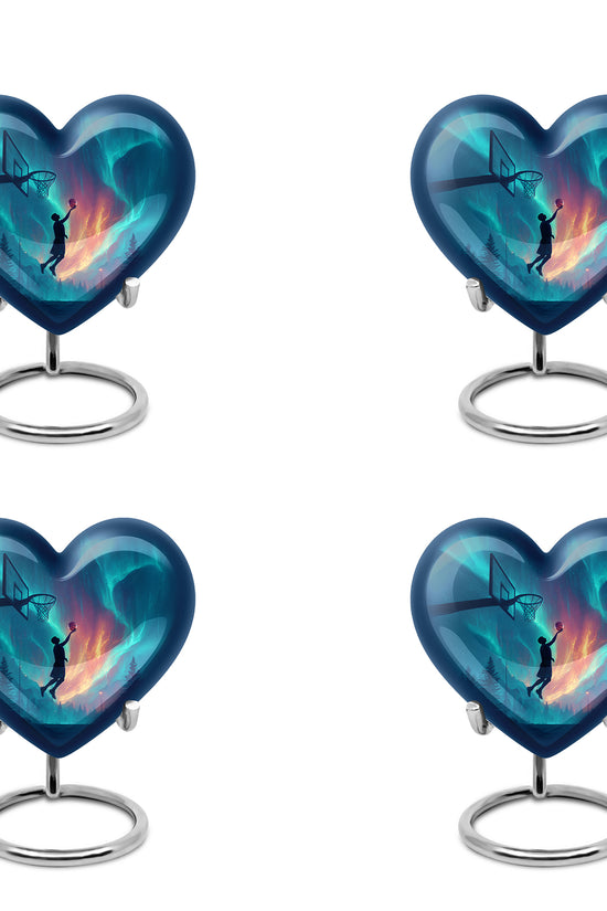 Soft Blue Basketball Cremation Urn angled view of lid and engraved motif - compassionate heart-basketball combination with gentle curves - 10 inch aluminum urn for cremated remains