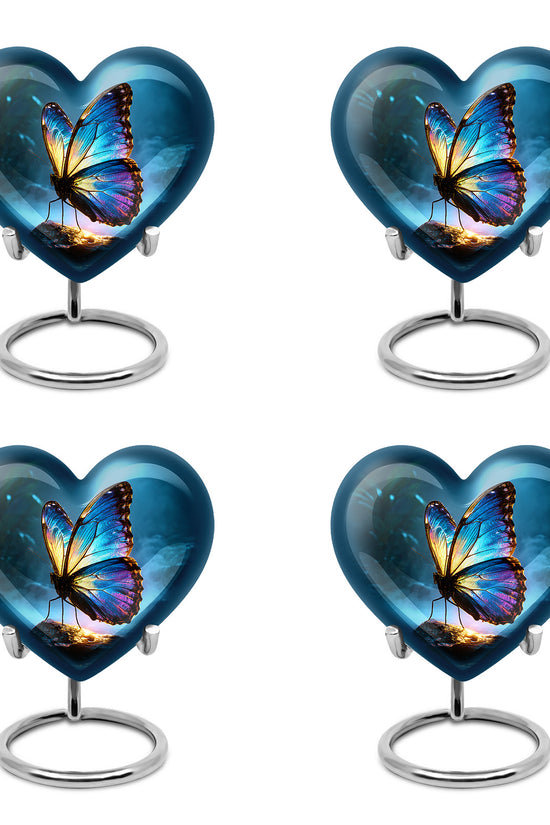 Dusty Blue Butterfly Cremation Urn angled view of lid and engraved motif - heart-shaped butterfly design symbolizing eternal love - 10 inch aluminum urn for cremated remains