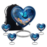 Indigo Butterfly Cremation Urn close-up of engraving and surface detail - heart-shaped butterfly design symbolizing eternal love - memorial set with one large and four small urns