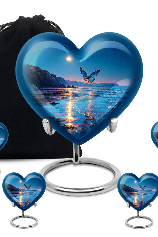 Vivid Blue Butterfly Cremation Urn close-up of engraving and surface detail - compassionate heart-butterfly combination with gentle curves - memorial set with one large and four small urns
