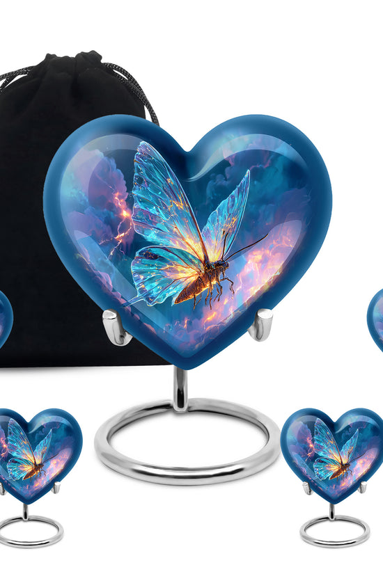 Sapphire Blue Butterfly Cremation Urn close-up of engraving and surface detail - compassionate heart-butterfly combination with gentle curves - memorial set with one large and four small urns