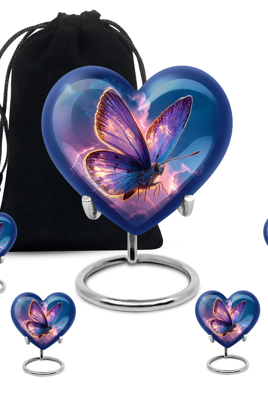 Sapphire Blue Butterfly Cremation Urn close-up of engraving and surface detail - compassionate heart-butterfly combination with gentle curves - memorial set with one large and four small urns