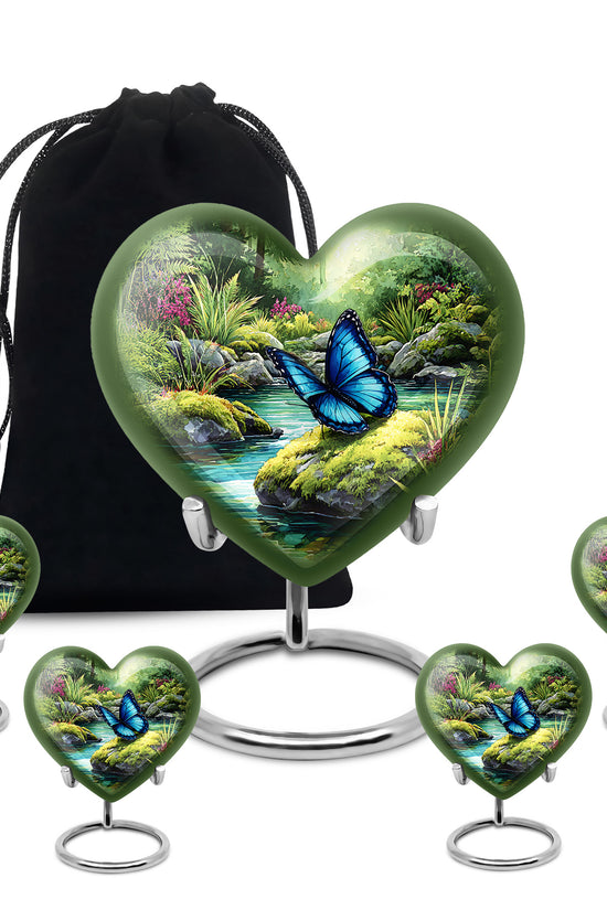 Emerald Green Butterfly Cremation Urn close-up of engraving and surface detail - heart-shaped butterfly design symbolizing eternal love - memorial set with one large and four small urns