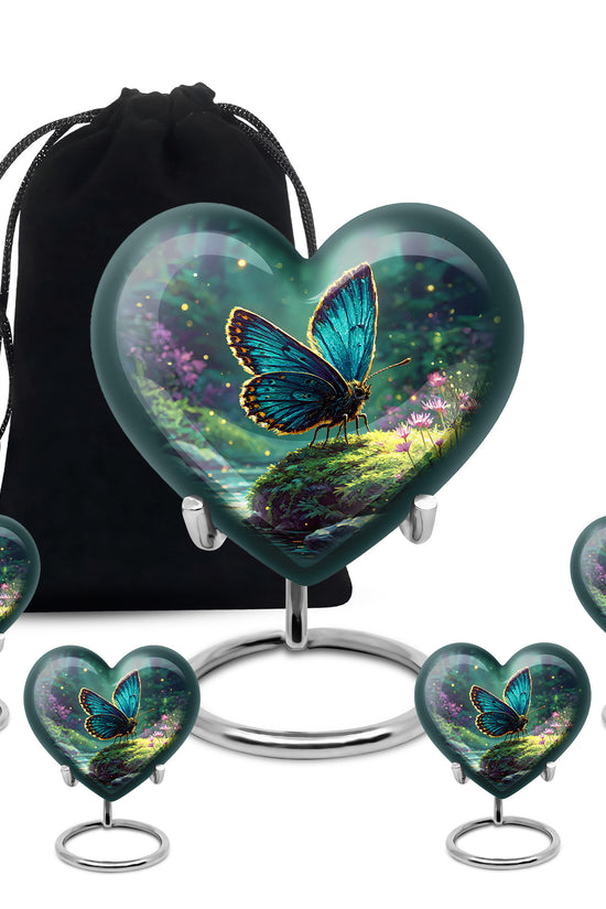 Mystic Teal Butterfly Cremation Urn close-up of engraving and surface detail - compassionate heart-butterfly combination with gentle curves - memorial set with one large and four small urns