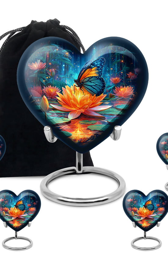 Twilight Blue Butterfly Cremation Urn close-up of engraving and surface detail - romantic heart urn with butterfly motif on aluminum - memorial set with one large and four small urns