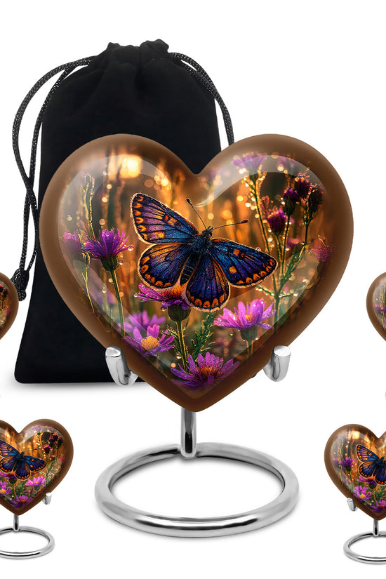 Matte Gold Butterfly Cremation Urn close-up of engraving and surface detail - romantic heart urn with butterfly motif on aluminum - memorial set with one large and four small urns