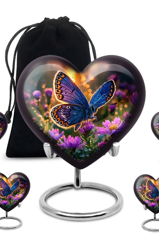 Burnished Gold Butterfly Cremation Urn close-up of engraving and surface detail - romantic heart urn with butterfly motif on aluminum - memorial set with one large and four small urns