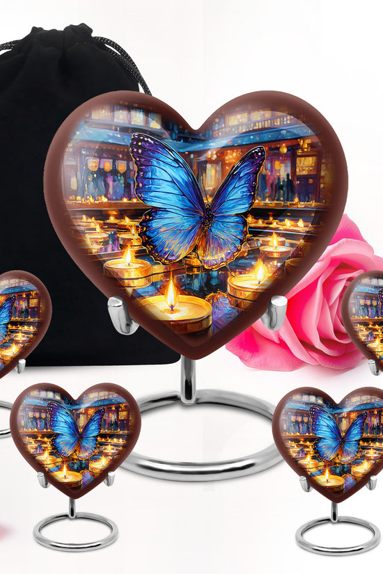 Mist Gray Butterfly Cremation Urn close-up of engraving and surface detail - heart-shaped butterfly design symbolizing eternal love - memorial set with one large and four small urns