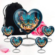 Calming Blue Butterfly Cremation Urn close-up of engraving and surface detail - romantic heart urn with butterfly motif on aluminum - memorial set with one large and four small urns