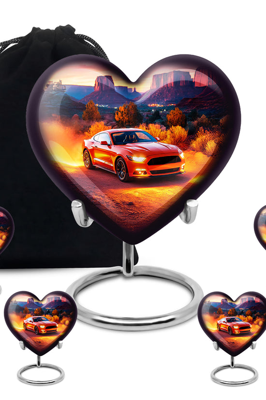Crimson Red Car Cremation Urn close-up of engraving and surface detail - loving heart memorial featuring car pattern - memorial set with one large and four small urns