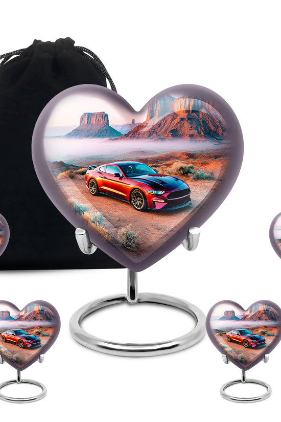 Polished Silver Car Cremation Urn close-up of engraving and surface detail - romantic heart urn with car motif on aluminum - memorial set with one large and four small urns