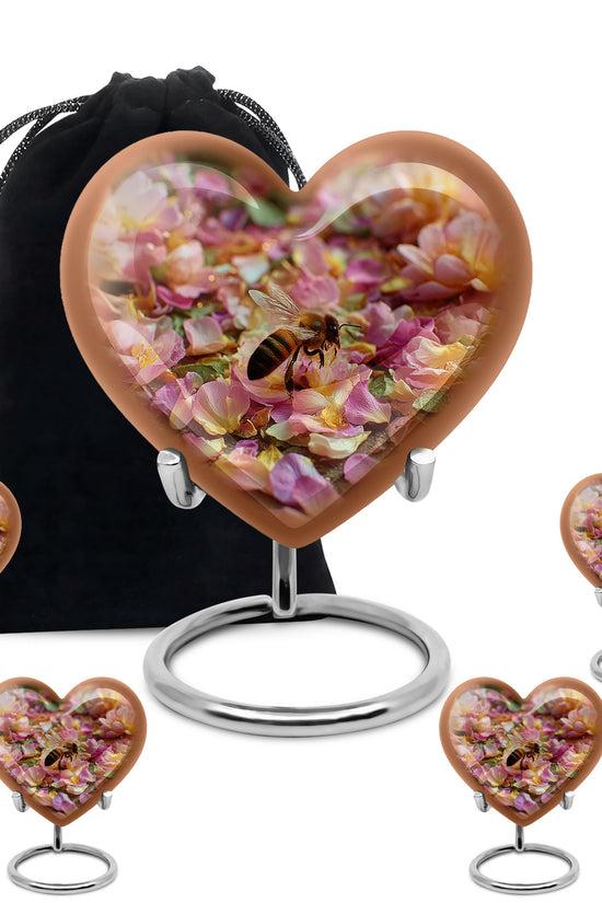 Sunrise Gold Bee Cremation Urn close-up of engraving and surface detail - loving heart memorial featuring bee pattern - memorial set with one large and four small urns