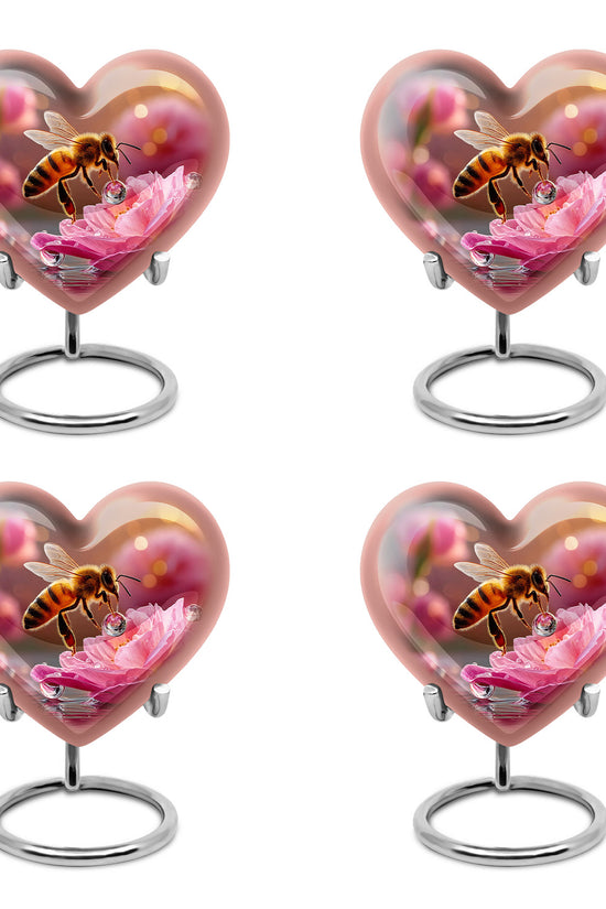 Royal Gold Bee Cremation Urn angled view of lid and engraved motif - compassionate heart-bee combination with gentle curves - 10 inch aluminum urn for cremated remains