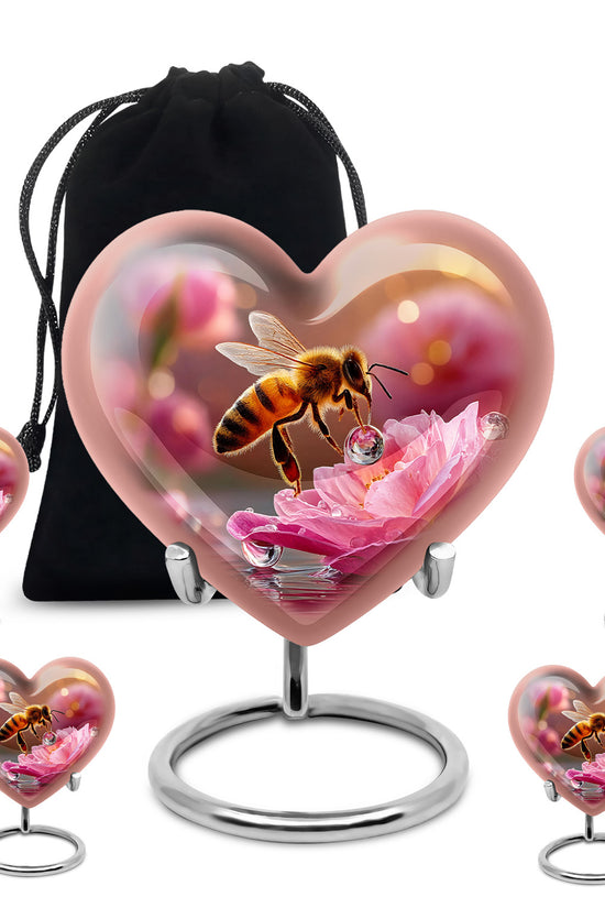 Warm Gold Bee Cremation Urn close-up of engraving and surface detail - compassionate heart-bee combination with gentle curves - memorial set with one large and four small urns