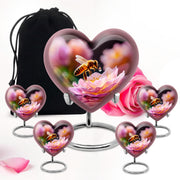 Onyx Black Bee Cremation Urn close-up of engraving and surface detail - romantic heart urn with bee motif on aluminum - memorial set with one large and four small urns