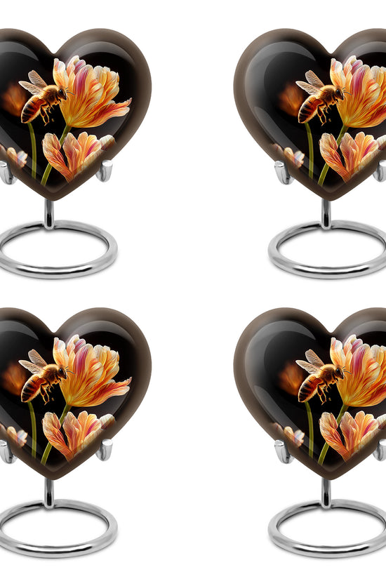 Onyx Black Bee Cremation Urn angled view of lid and engraved motif - compassionate heart-bee combination with gentle curves - 10 inch aluminum urn for cremated remains