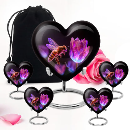 Obsidian Black Bee Cremation Urn close-up of engraving and surface detail - compassionate heart-bee combination with gentle curves - memorial set with one large and four small urns