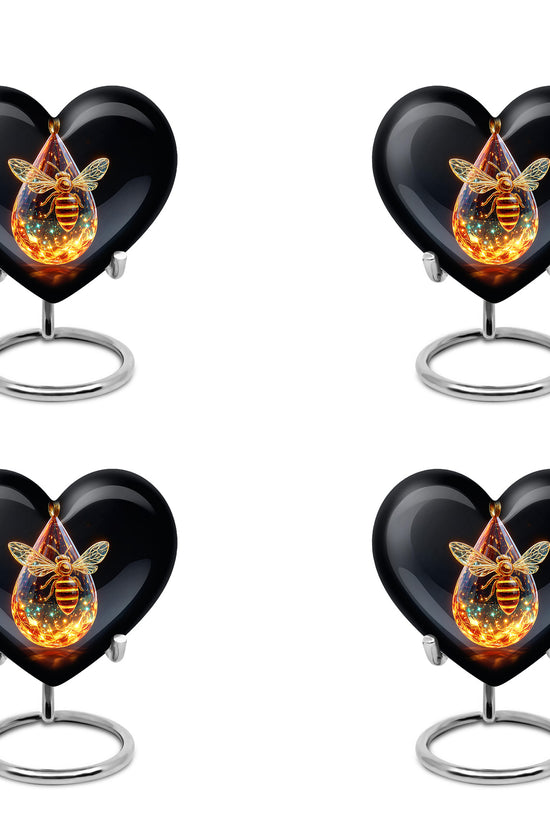 Glossy Black Bee Cremation Urn angled view of lid and engraved motif - loving heart memorial featuring bee pattern - 10 inch aluminum urn for cremated remains