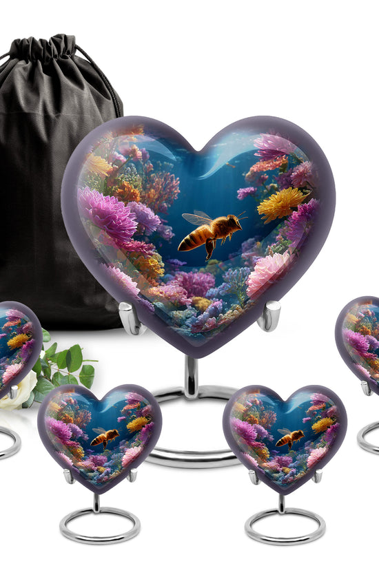 Celestial Blue Bee Cremation Urn close-up of engraving and surface detail - heart-shaped bee design symbolizing eternal love - memorial set with one large and four small urns