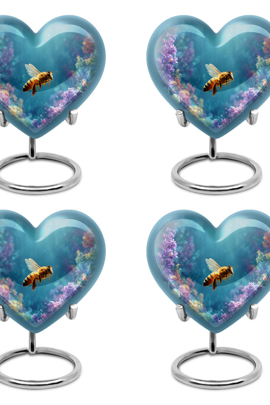 Tropical Teal Bee Cremation Urn angled view of lid and engraved motif - compassionate heart-bee combination with gentle curves - 10 inch aluminum urn for cremated remains