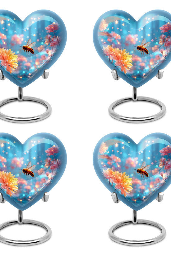 Soft Blue Bee Cremation Urn angled view of lid and engraved motif - romantic heart urn with bee motif on aluminum - 10 inch aluminum urn for cremated remains
