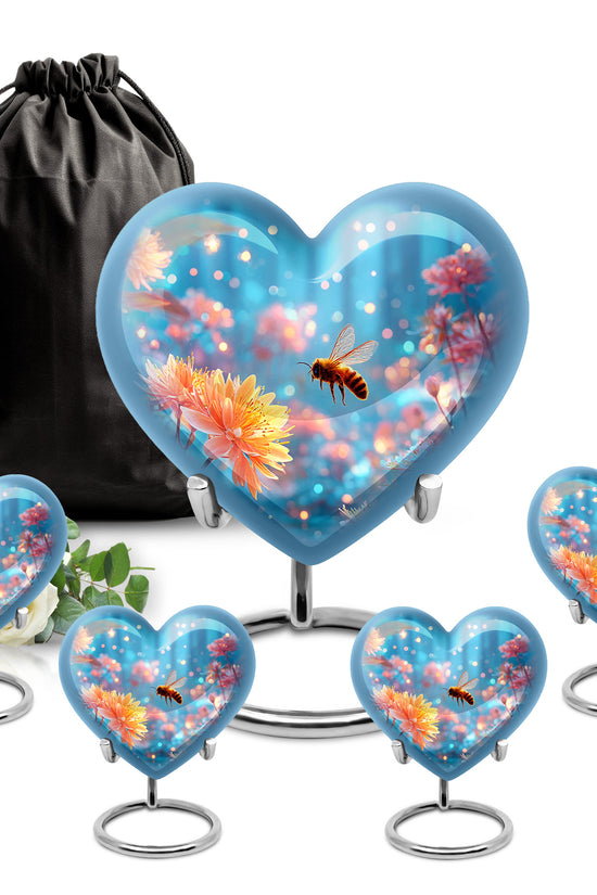 Slate Blue Bee Cremation Urn close-up of engraving and surface detail - loving heart memorial featuring bee pattern - memorial set with one large and four small urns