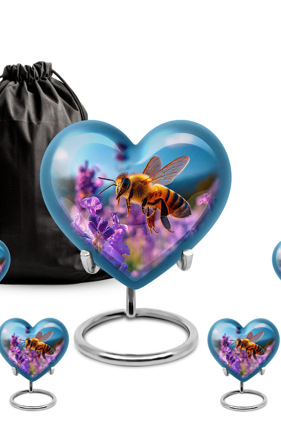 Steel Blue Bee Cremation Urn close-up of engraving and surface detail - romantic heart urn with bee motif on aluminum - memorial set with one large and four small urns