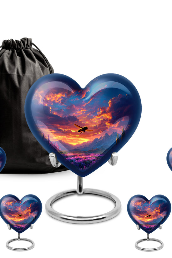 Twilight Blue Bee Cremation Urn close-up of engraving and surface detail - compassionate heart-bee combination with gentle curves - memorial set with one large and four small urns