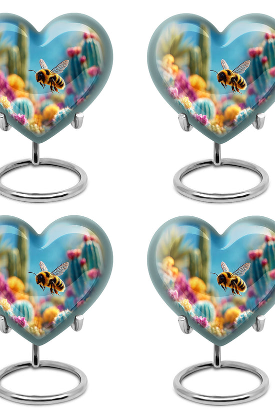 Sapphire Blue Bee Cremation Urn angled view of lid and engraved motif - romantic heart urn with bee motif on aluminum - 10 inch aluminum urn for cremated remains