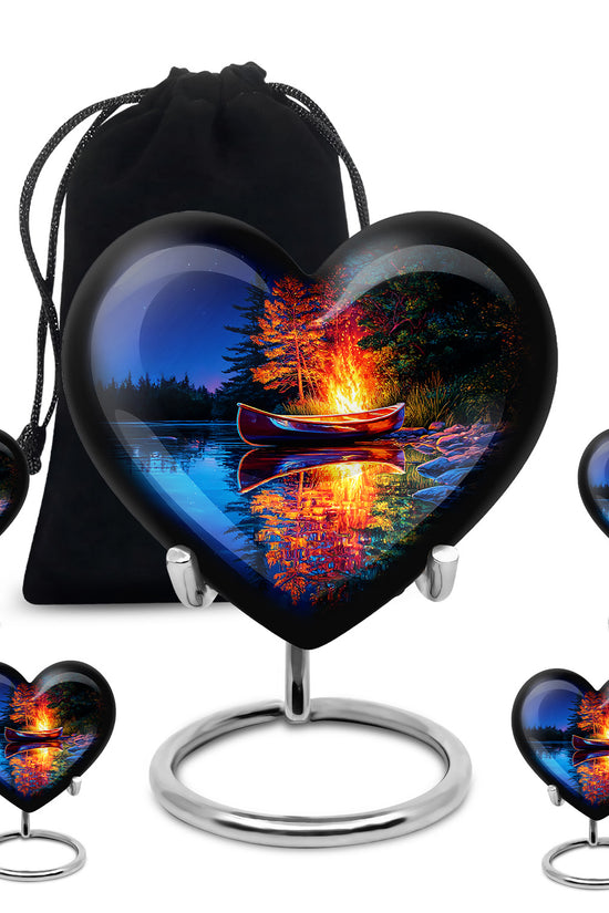 Azure Campfire Cremation Urn close-up of engraving and surface detail - heart-shaped campfire design symbolizing eternal love - memorial set with one large and four small urns